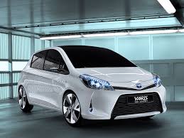 White Toyota Yaris Hybrid.